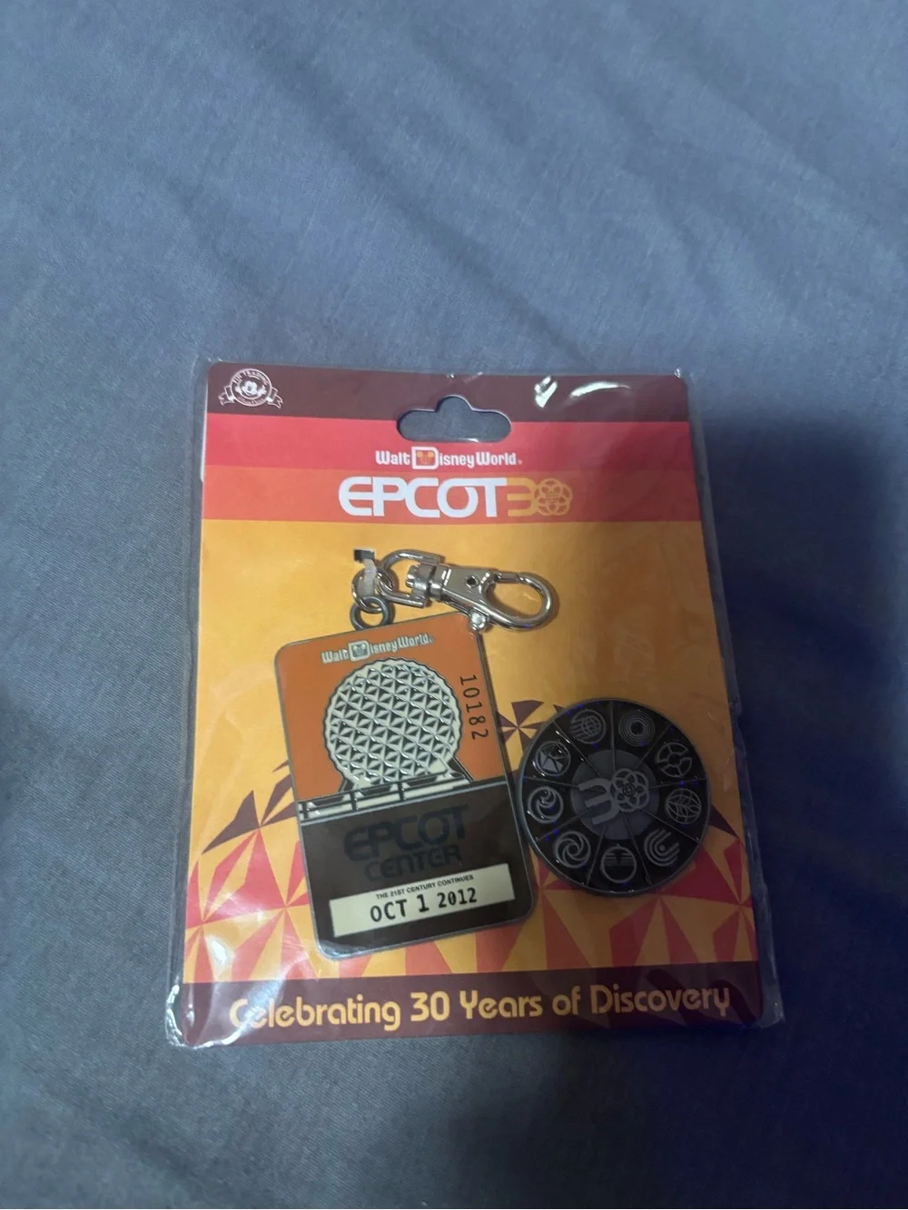 Disney EPCOT Orange and Black Keychain & Pin Set